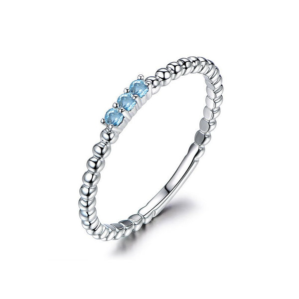 Blue Natural Topaz Wedding Band in Sterling Silver