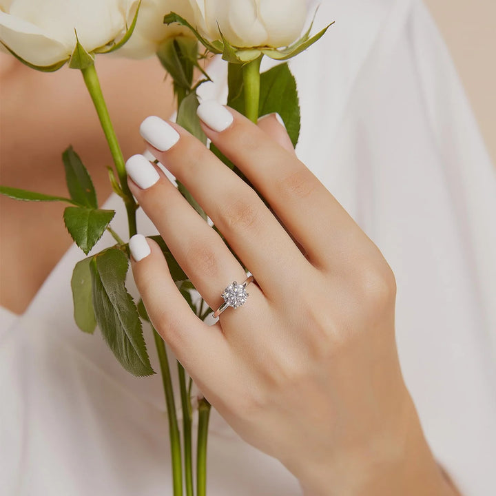 2 carats moissanite solitaire engagement ring worn on hand