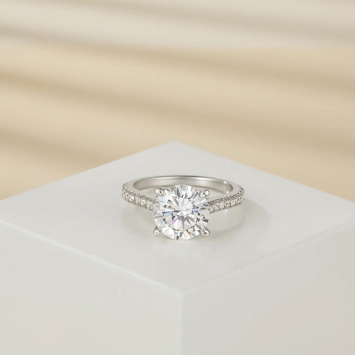 Close-up detail of 3.5 carats round cut moissanite diamond pave ring 