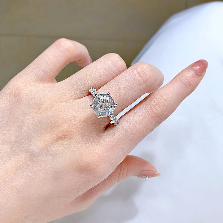 5 carat moissanite ring on hand
