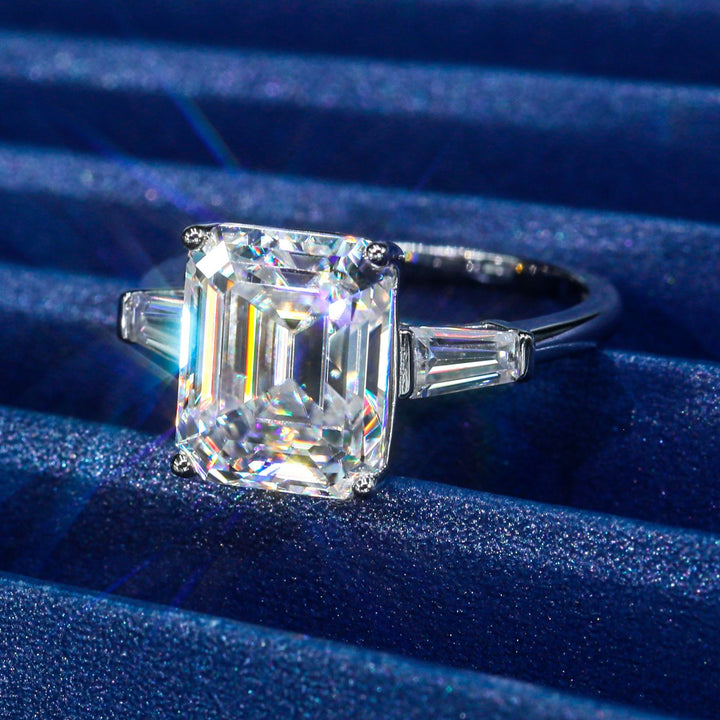 Close-up detail of 5ct emerald cut moissanite wedding ring