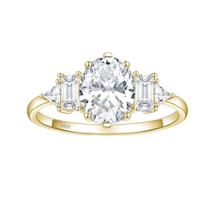 Gold Three Stone Oval Engagement Ring with Moissanite