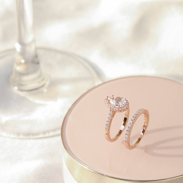 Rose Gold 1.5CT moissanite bridal set on hand