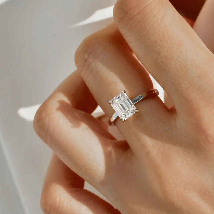 Affordable 2ct moissanite engagement rings worn on hand