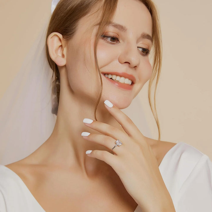 affordable 3 carats emerald engagement ring on hand