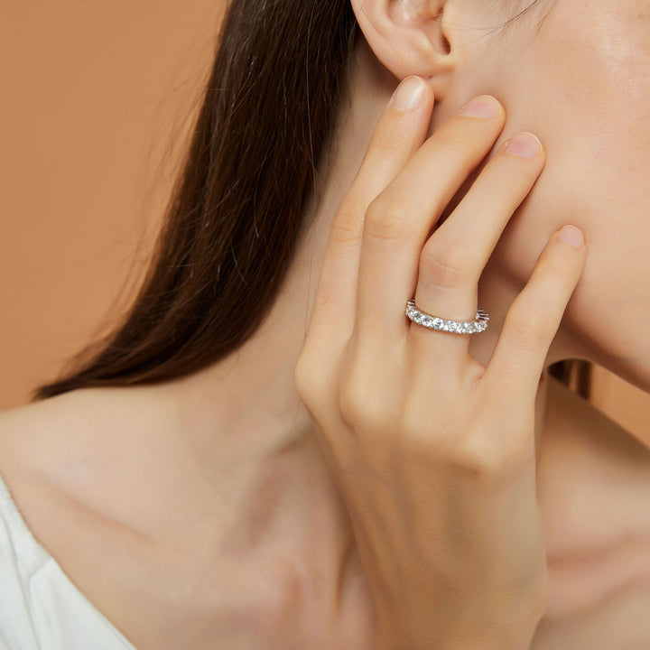 affordable full moissanite wedding band worn on hand