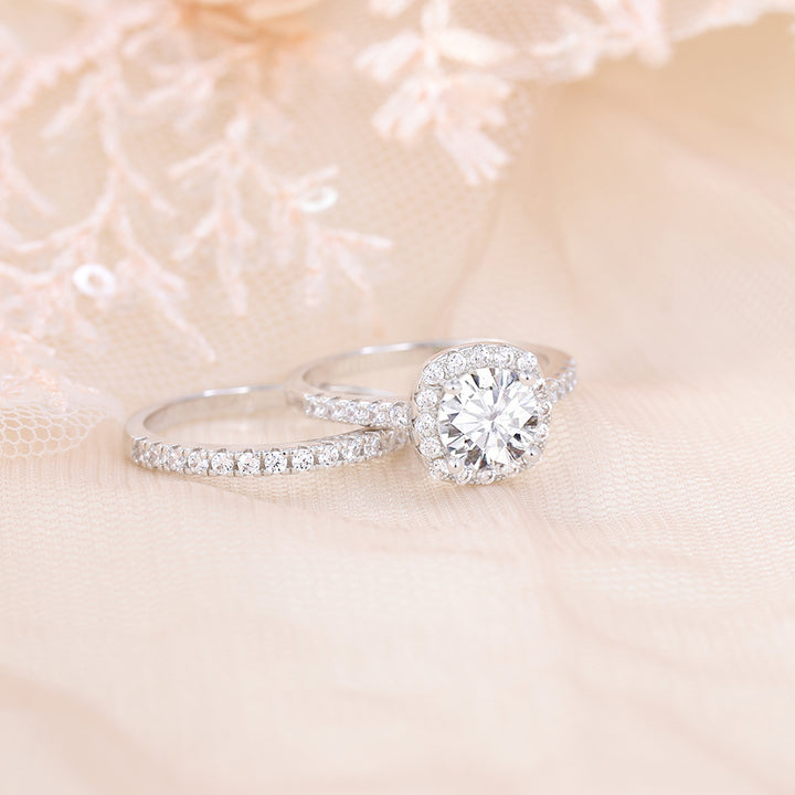Affordable halo engagement ring and half pave band