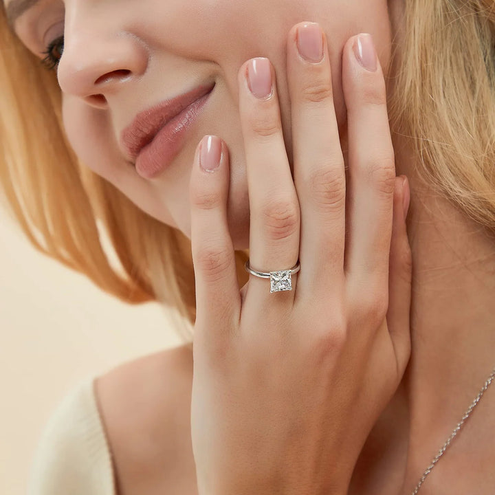 affordable princess moissanite engagement ring worn on hand