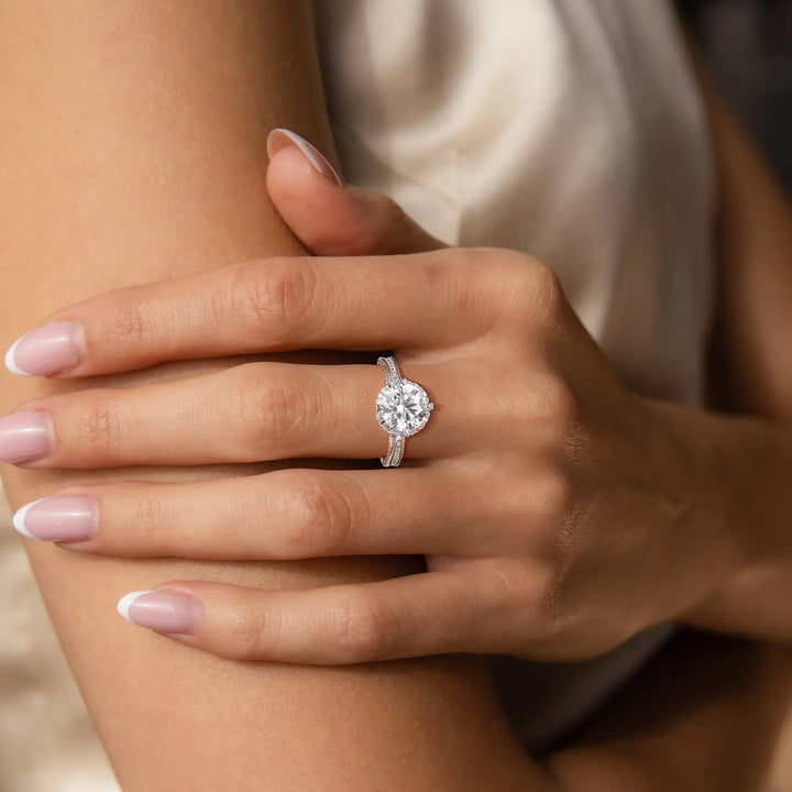  bow tie 3ct moissanite engagement ring worn on hand