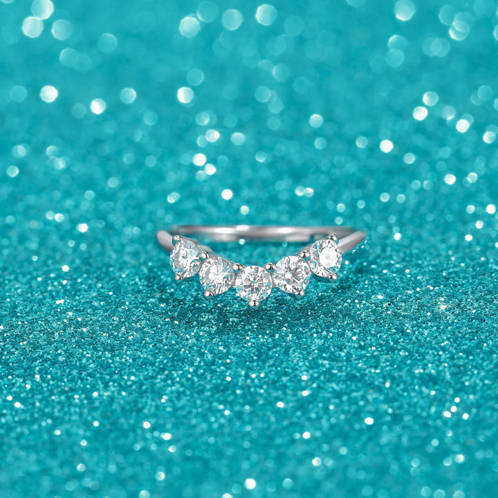 brilliant curved moissanite wedding band