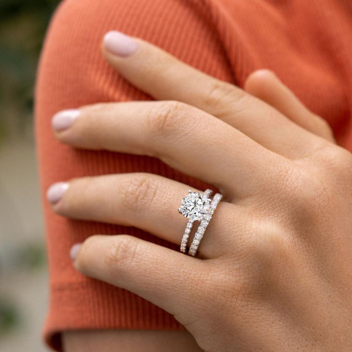 classic moissanite wedding bands worn on hand