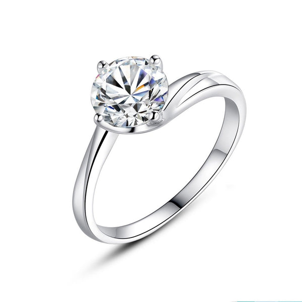 cubic zirconia engagement ring in sterling silver four claws