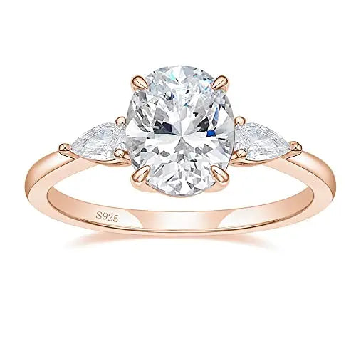 Dazzling rose gold oval cut three stone engagement ring
