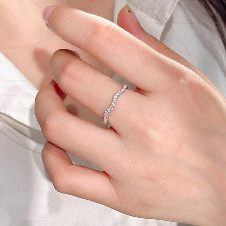 eternity band ring worn on hand