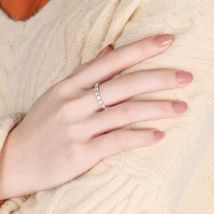 eternity wedding band in 925 sterling silver worn on hand