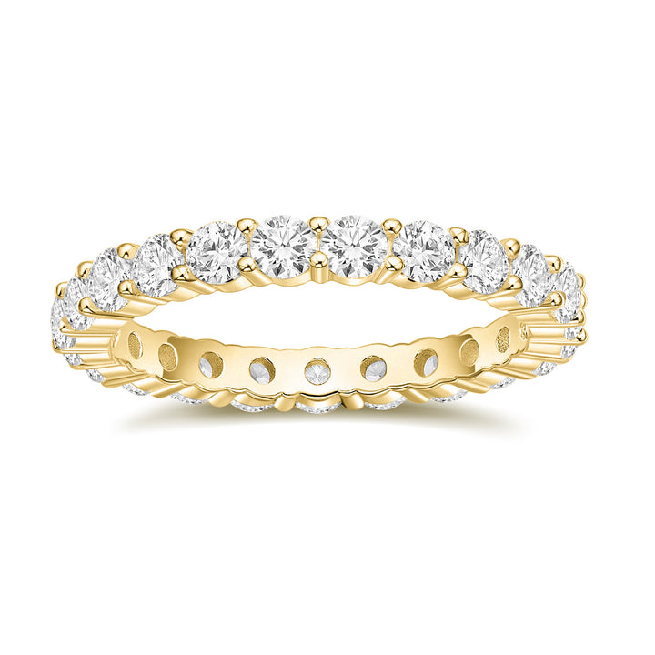 gold band ring with moissanite dazzling