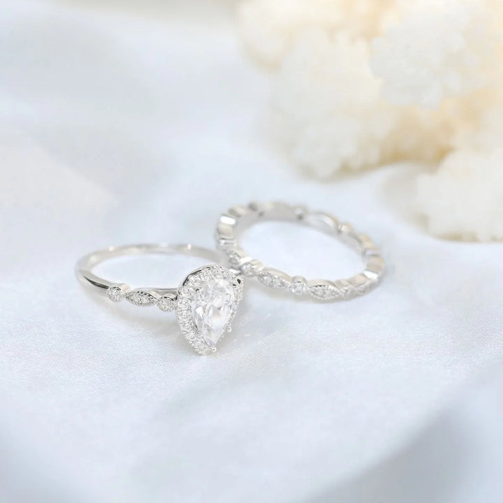 halo engagemenr ring and a half eternity band