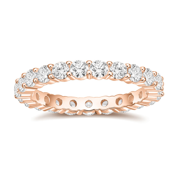 rose gold band ring with moissanite dazzling