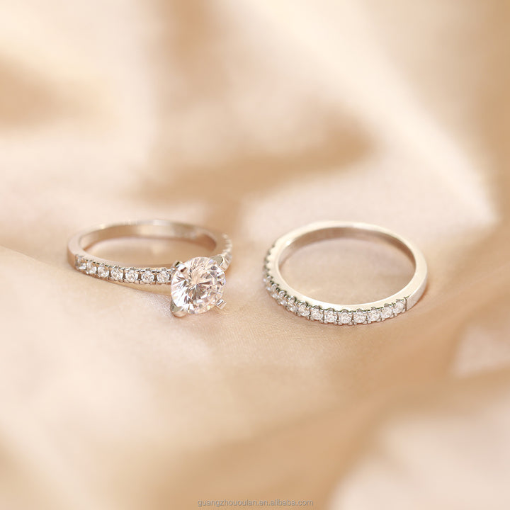 silver engagement ring and half eternity band ring