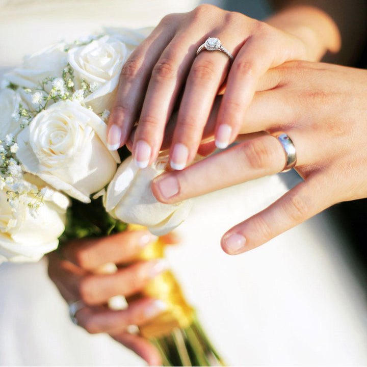 1.2ct moissanite engagement ring worn on hand