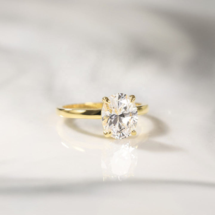 Gold oval cut 3ct moissanite wedding ring