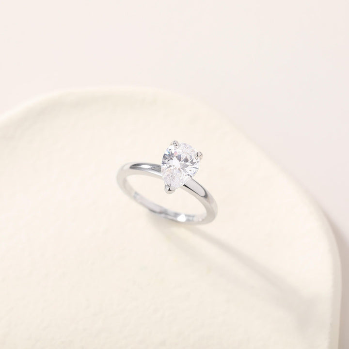 Close-up detail of s925 2ct pear cut moissanite engagement ring
